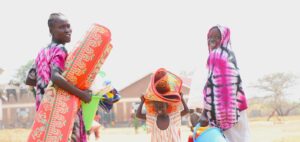 Family happy to receive essential items.